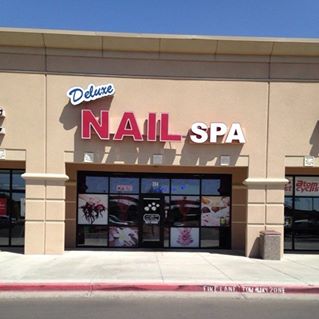 Deluxe Nail Spa logo